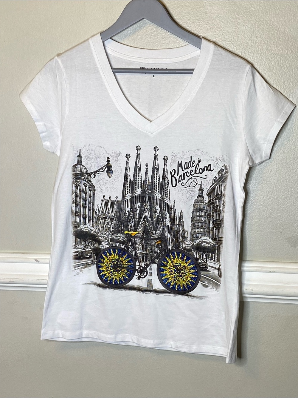White 'Made in Barcelona' V-Neck Graphic Tee with Yellow & Blue Accents